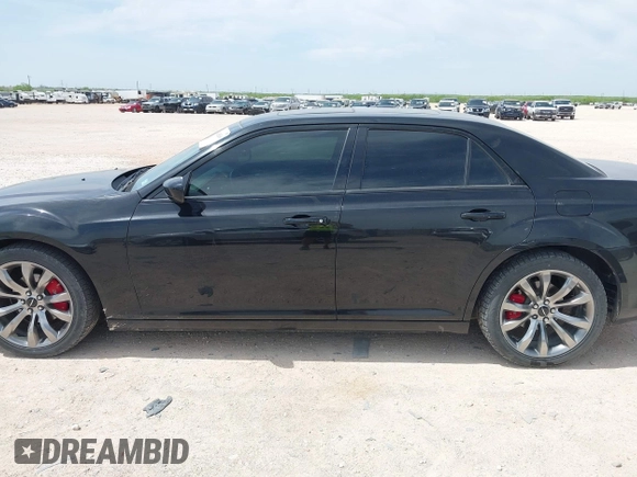 2014 Chrysler 300 S with VIN 2C3CCABG8EH376795, listed as a IAAI auction lot 42038260 with 134,265 mi miles and . Bid and sale history available at carsss.com. Image 14.