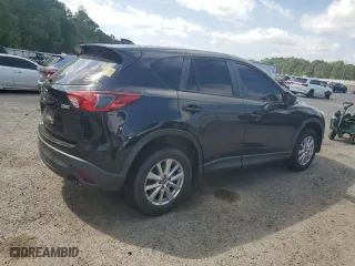 2014 Mazda CX-5 Touring with VIN JM3KE2CY7E0427312, listed as a Copart auction lot 52869335 with 192,903 mi miles and Salvage Title. Bid and sale history available at carsss.com. Image 3.
