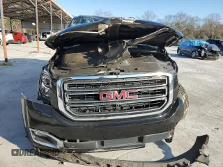 2019 GMC Yukon SLE with VIN 1GKS1AKC6KR302642, listed as a Copart auction lot 41510715 with 97,906 mi miles and Salvage Title. Bid and sale history available at carsss.com. Image 5.