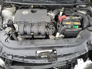 2014 Nissan Sentra SV z VIN 3N1AB7AP8EY289406, wystawiony jako Copart lot #56767635 z przebiegiem 52 077 mil mil oraz Szkoda całkowita • Salvage title. Historia ofert i sprzedaży dostępna na DreamBid. Obrazek 11.