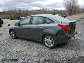 2016 Ford Focus SE with VIN 1FADP3F2XGL303275, listed as a Copart auction lot 53241255 with 106,338 mi miles and Salvage Title. Bid and sale history available at carsss.com. Image 2.