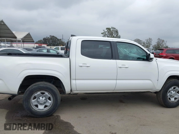 2021 Toyota Tacoma SR with VIN 3TYAX5GNXMT032184, listed as a IAAI auction lot 42204429 with 60,295 mi miles and . Bid and sale history available at DreamBid. Image 13.