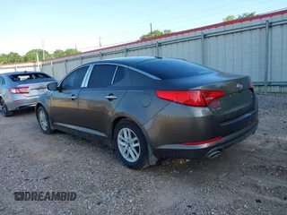 2011 Kia Optima LX with VIN KNAGM4A74B5085319, listed as a IAAI auction lot 42061665 with 224,517 mi miles and . Bid and sale history available at carsss.com. Image 3.