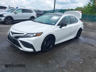 2023 Toyota Camry TRD z VIN 4T1KZ1AK8PU073362, wystawiony jako IAAI lot #42244183 z przebiegiem 103 245 mil mil oraz . Historia ofert i sprzedaży dostępna na DreamBid. Obrazek 2.