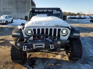 2018 Jeep Wrangler Unlimited Rubicon with VIN 1C4HJXFG8JW104425, listed as a Copart auction lot 87545965 with 62,988 mi miles and Salvage title. Bid and sale history available at DreamBid. Image 5.