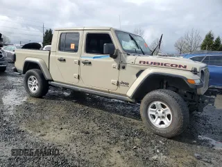 2020 Jeep Gladiator Rubicon with VIN 1C6JJTBG5LL178882, listed as a Copart auction lot 47971205 with 102,757 mi miles and Salvage Title. Bid and sale history available at DreamBid. Image 4.
