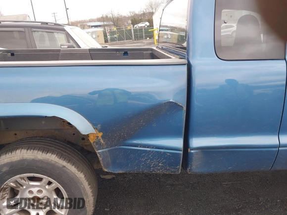 2003 Dodge Dakota Sport with VIN 1D7HG32NX3S322085, listed as a IAAI auction lot 41780125 with 95,321 mi miles. Bid and sale history available at carsss.com. Image 6.