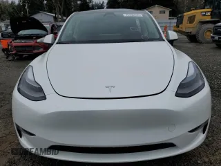 2023 Tesla Model Y Long Range z VIN 7SAYGDEE4PF836872, wystawiony jako Copart lot #45566235 z przebiegiem 7 674 mil mil oraz Szkoda całkowita • Salvage title. Historia ofert i sprzedaży dostępna na DreamBid. Obrazek 5.