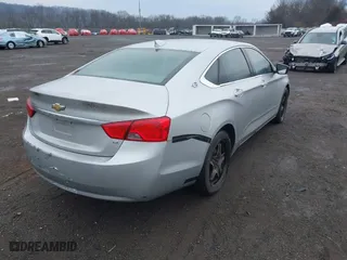 2016 Chevrolet Impala LS with VIN 2G11X5SAXG9171611, listed as a IAAI auction lot 41669397 with 210,217 mi miles. Bid and sale history available at carsss.com. Image 4.