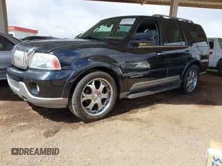 2004 Lincoln Navigator Luxury with VIN 5LMFU27R04LJ16634, listed as a IAAI auction lot 41922950 with 125,080 mi miles. Bid and sale history available at carsss.com. Image 2.