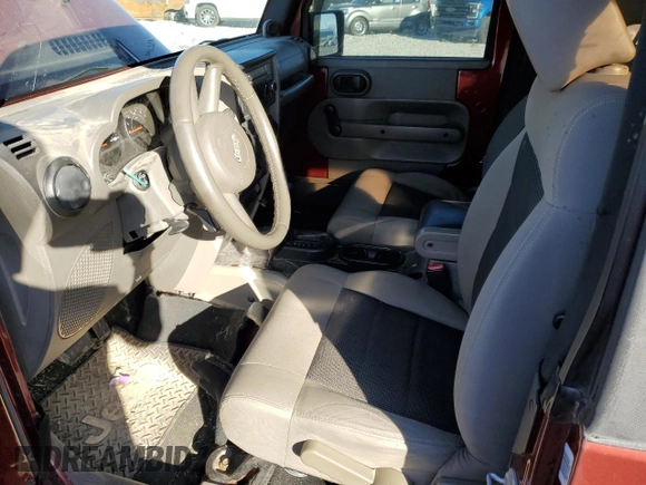 2008 Jeep Wrangler X with VIN 1J4FA24138L650659, listed as a Copart auction lot 70510504 with 170,806 mi miles and Salvage Title. Bid and sale history available at DreamBid. Image 7.