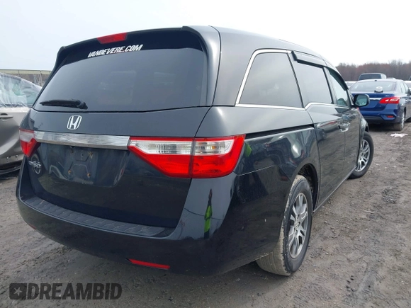 2012 Honda Odyssey EX-L with VIN 5FNRL5H63CB070361, listed as a IAAI auction lot 42025024 with 152,258 mi miles and . Bid and sale history available at carsss.com. Image 4.