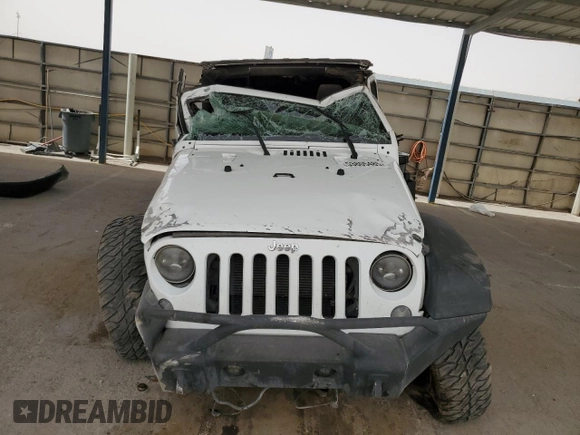 2013 Jeep Wrangler Unlimited Sport z VIN 1C4BJWDG8DL513680, wystawiony jako Copart lot #53805485 z przebiegiem 135 676 mil mil oraz Szkoda całkowita • Salvage title. Historia ofert i sprzedaży dostępna na DreamBid. Obrazek 5.