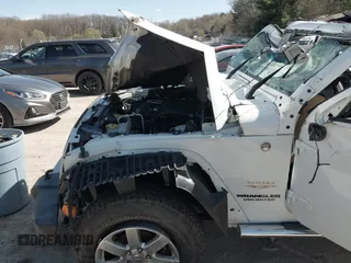 2013 Jeep Wrangler Unlimited Moab with VIN 1C4HJWEG7DL569862, listed as a IAAI auction lot 42095535 with Not provided miles and . Bid and sale history available at DreamBid. Image 11.