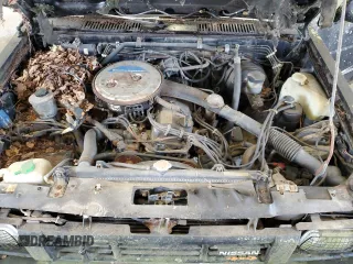 1986 Nissan Hardbody E z VIN 1N6ND16Y7GC413942, wystawiony jako Copart lot #57677605 z przebiegiem 126 183 mil mil oraz Tytuł czysty. Historia ofert i sprzedaży dostępna na DreamBid. Obrazek 11.