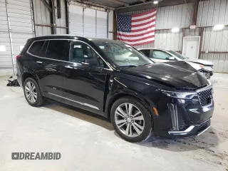 2023 Cadillac XT6 AWD Premium Luxury with VIN 1GYKPFRS3PZ121942, listed as a Copart auction lot 46489545 with 35,453 mi miles and Salvage Title. Bid and sale history available at carsss.com. Image 4.