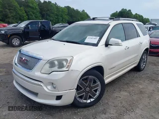 2012 GMC Acadia Denali with VIN 1GKKVTED5CJ197001, listed as a IAAI auction lot 42303383 with 211,958 mi miles and . Bid and sale history available at DreamBid. Image 2.