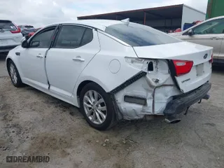 2015 Kia Optima LX with VIN 5XXGM4A73FG443157, listed as a IAAI auction lot 41910397 with 193,045 mi miles. Bid and sale history available at carsss.com. Image 3.