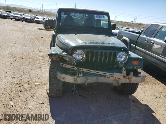 1997 Jeep Wrangler Sahara with VIN 1J4FY49S6VP521988, listed as a Copart auction lot 80753494 with 99,909 mi miles and Salvage Title. Bid and sale history available at carsss.com. Image 5.