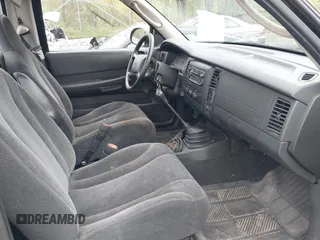 2004 Dodge Dakota with VIN 1D7GG16K44S588932, listed as a IAAI auction lot 42205360 with 77,465 mi miles and . Bid and sale history available at carsss.com. Image 5.