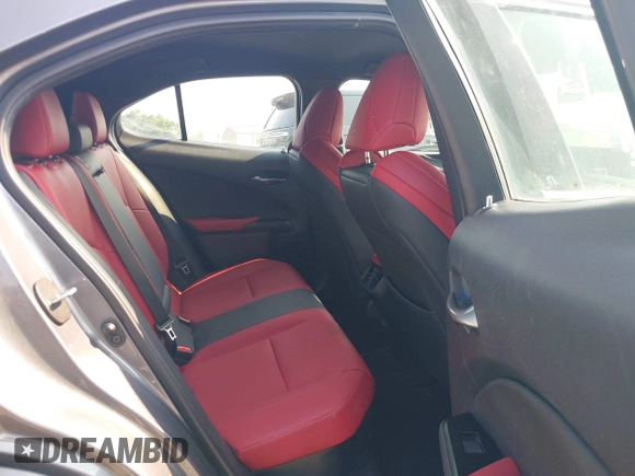 2021 Lexus UX 250h F Sport z VIN JTHE9JBHXM2045377, wystawiony jako IAAI lot #42580566 z przebiegiem 52 838 mil mil oraz . Historia ofert i sprzedaży dostępna na DreamBid. Obrazek 8.