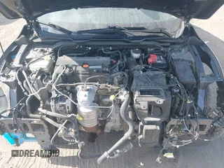 2020 Honda Civic LX with VIN 2HGFC2F65LH505932, listed as a IAAI auction lot 40046863 with 59,768 mi miles and . Bid and sale history available at DreamBid. Image 10.