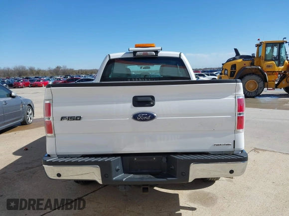 2014 Ford F-150 XL with VIN 1FTEX1CM4EKE58061, listed as a IAAI auction lot 41669258 with 195,232 mi miles. Bid and sale history available at carsss.com. Image 15.