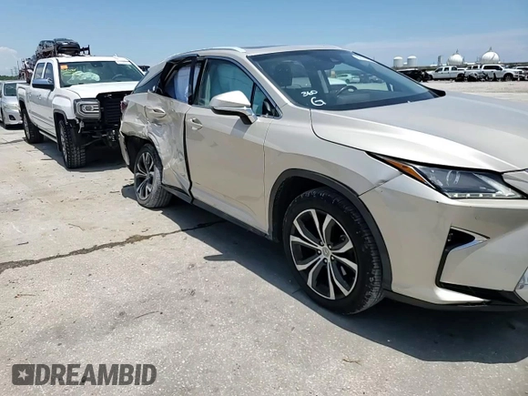 2016 Lexus RX 350 с VIN 2T2ZZMCA5GC027635, выставлен на аукционе Copart как лот 62029095 с пробегом 80 609 миль миль и Списание • Salvage title. История ставок и продаж доступна на DreamBid. Изображение 14.