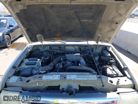 2000 Ford Ranger XL with VIN 1FTYR10CXYPA60122, listed as a IAAI auction lot 41879932 with 161,820 mi miles. Bid and sale history available at carsss.com. Image 10.