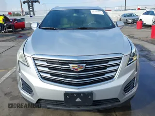 2017 Cadillac XT5 FWD with VIN 1GYKNARS7HZ144148, listed as a IAAI auction lot 41392399 with 96,252 mi miles and . Bid and sale history available at carsss.com. Image 12.