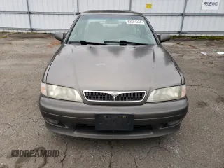 2000 Infiniti G20 Luxury z VIN JNKCP11A5YT303404, wystawiony jako Copart lot #82801234 z przebiegiem 178 185 mil mil oraz Tytuł czysty. Historia ofert i sprzedaży dostępna na DreamBid. Obrazek 5.