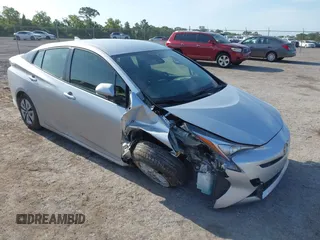 2017 Toyota Prius Two z VIN JTDKARFU8H3046058, wystawiony jako IAAI lot #42169692 z przebiegiem 79 226 mil mil oraz . Historia ofert i sprzedaży dostępna na DreamBid. Obrazek 1.