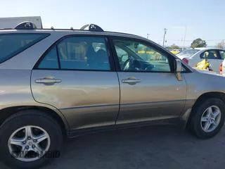 1999 Lexus RX 300 with VIN JT6HF10U6X0092078, listed as a IAAI auction lot 41988259 with 144,148 mi miles and . Bid and sale history available at DreamBid. Image 13.