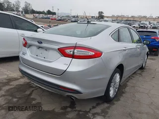 2016 Ford Fusion Energi SE Luxury with VIN 3FA6P0PU9GR357076, listed as a IAAI auction lot 42081615 with 174,234 mi miles. Bid and sale history available at carsss.com. Image 4.