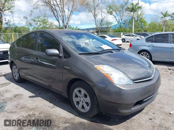 2009 Toyota Prius with VIN JTDKB20U693486715, listed as a IAAI auction lot 41689082 with 154,482 mi miles. Bid and sale history available at carsss.com. Image 1.
