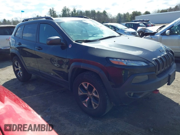 2014 Jeep Cherokee Trailhawk with VIN 1C4PJMBS3EW127749, listed as a IAAI auction lot 41836617 with 207,002 mi miles and . Bid and sale history available at DreamBid. Image 1.