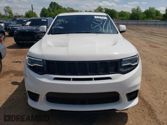 2018 Jeep Grand Cherokee with VIN NJ1449E, listed as a Copart auction lot 51357834 with 32,619 mi miles and Salvage title. Bid and sale history available at DreamBid. Image 5.