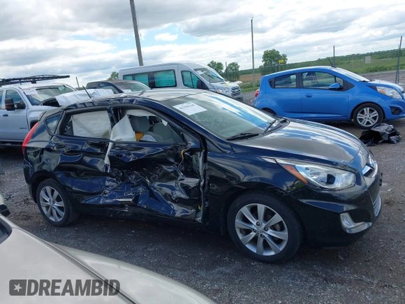 2012 Hyundai Accent SE z VIN KMHCU5AE0CU031475, wystawiony jako IAAI lot #42196146 z przebiegiem 122 489 mil mil oraz . Historia ofert i sprzedaży dostępna na DreamBid. Obrazek 13.