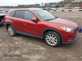 2013 Mazda CX-5 Grand Touring with VIN JM3KE4DE8D0164374, listed as a IAAI auction lot 41820866 with 145,815 mi miles. Bid and sale history available at carsss.com. Image 1.