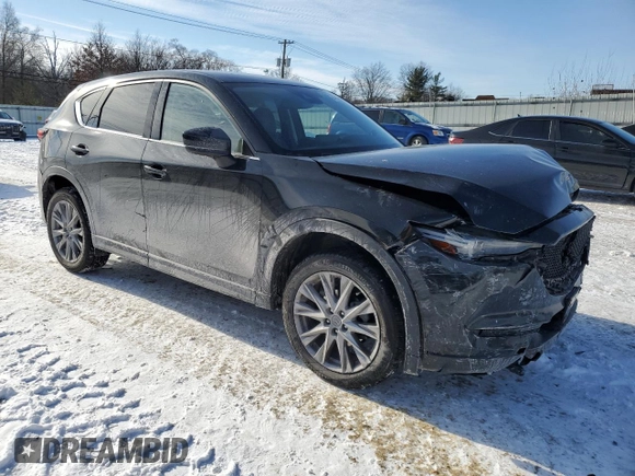 2021 Mazda CX-5 Grand Touring with VIN JM3KFBDM5M1456650, listed as a Copart auction lot 42124045 with 45,205 mi miles and Salvage Title. Bid and sale history available at carsss.com. Image 4.
