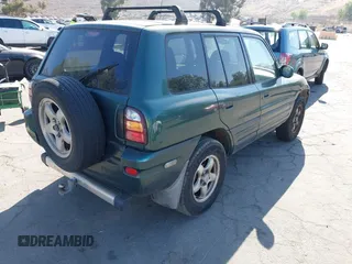 2000 Toyota RAV4 with VIN JT3GP10V4Y7067848, listed as a IAAI auction lot 42689181 with 174,750 mi miles and . Bid and sale history available at DreamBid. Image 4.