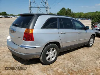2006 Chrysler Pacifica Touring z VIN 2A4GF68496R757964, wystawiony jako Copart lot #52247615 z przebiegiem 107 155 mil mil oraz Tytuł czysty. Historia ofert i sprzedaży dostępna na DreamBid. Obrazek 3.