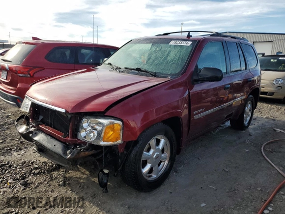 2006 GMC Envoy SLT with VIN 1GKDS13S762259102, listed as a Copart auction lot 79233224 with 125,404 mi miles and Salvage Title. Bid and sale history available at carsss.com. Image 1.