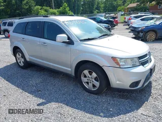 2011 Dodge Journey Mainstreet with VIN 3D4PH1FGXBT549084, listed as a IAAI auction lot 42641043 with 125,153 mi miles and . Bid and sale history available at DreamBid. Image 1.