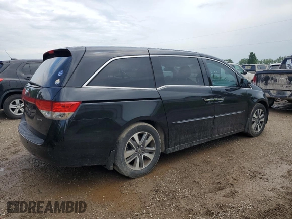 2015 Honda Odyssey Touring Elite with VIN 5FNRL5H9XFB058805, listed as a Copart auction lot 60433785 with 148,320 mi miles and Clean title. Bid and sale history available at DreamBid. Image 3.