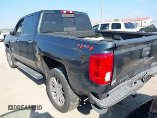 2018 Chevrolet Silverado 1500 High Country with VIN 3GCUKTEC8JG308353, listed as a IAAI auction lot 40714183 with 88,711 mi miles and . Bid and sale history available at DreamBid. Image 3.