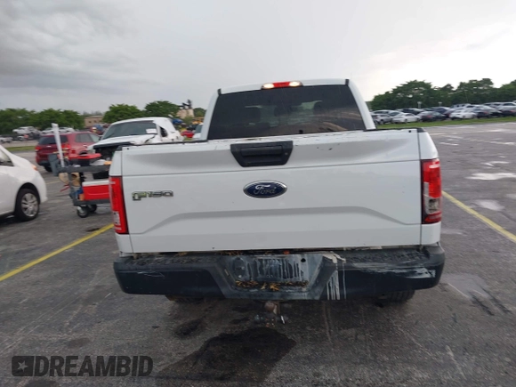 2015 Ford F-150 XL with VIN 1FTEX1CP7FFB56879, listed as a IAAI auction lot 42414408 with 212,042 mi miles and . Bid and sale history available at DreamBid. Image 16.