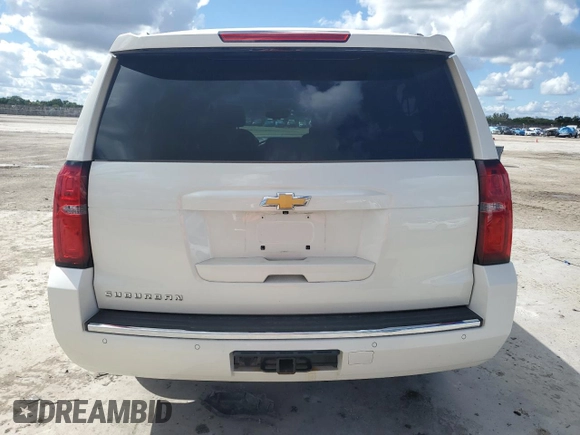 2015 Chevrolet Suburban LTZ with VIN 1GNSKKKC0FR130023, listed as a Copart auction lot 46630825 with 140,057 mi miles and Salvage Title. Bid and sale history available at carsss.com. Image 6.