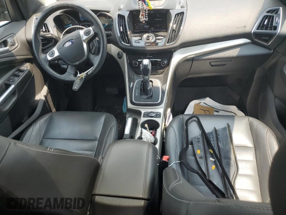 2013 Ford Escape SEL z VIN 1FMCU9H94DUD47723, wystawiony jako Copart lot #59765595 z przebiegiem 129 551 mil mil oraz Szkoda całkowita • Salvage title. Historia ofert i sprzedaży dostępna na DreamBid. Obrazek 8.