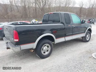 2000 Ford F-150 XL with VIN 1FTRX18L0YNC05663, listed as a IAAI auction lot 41413835 with 1 mi miles. Bid and sale history available at carsss.com. Image 4.